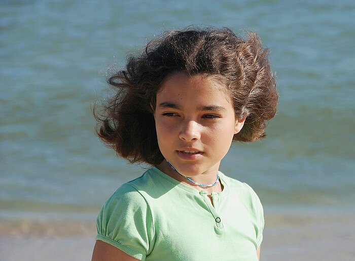 Mädchen aus Portugal am Strand